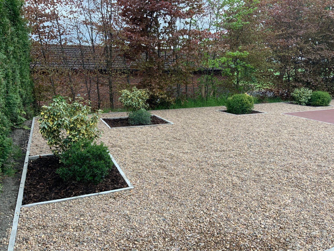 Gravel pathway around flowers